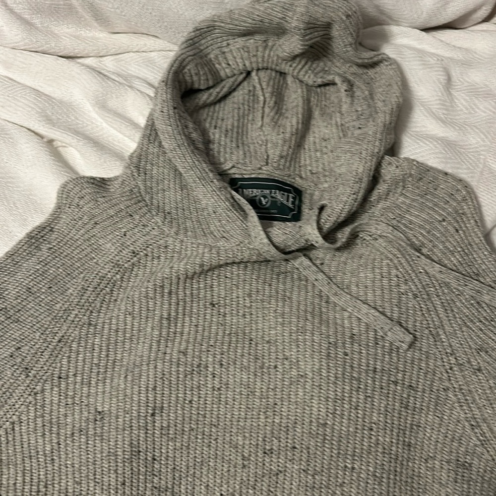 American Eagle size large hooded sweater, cream with flex’s of black and gray.